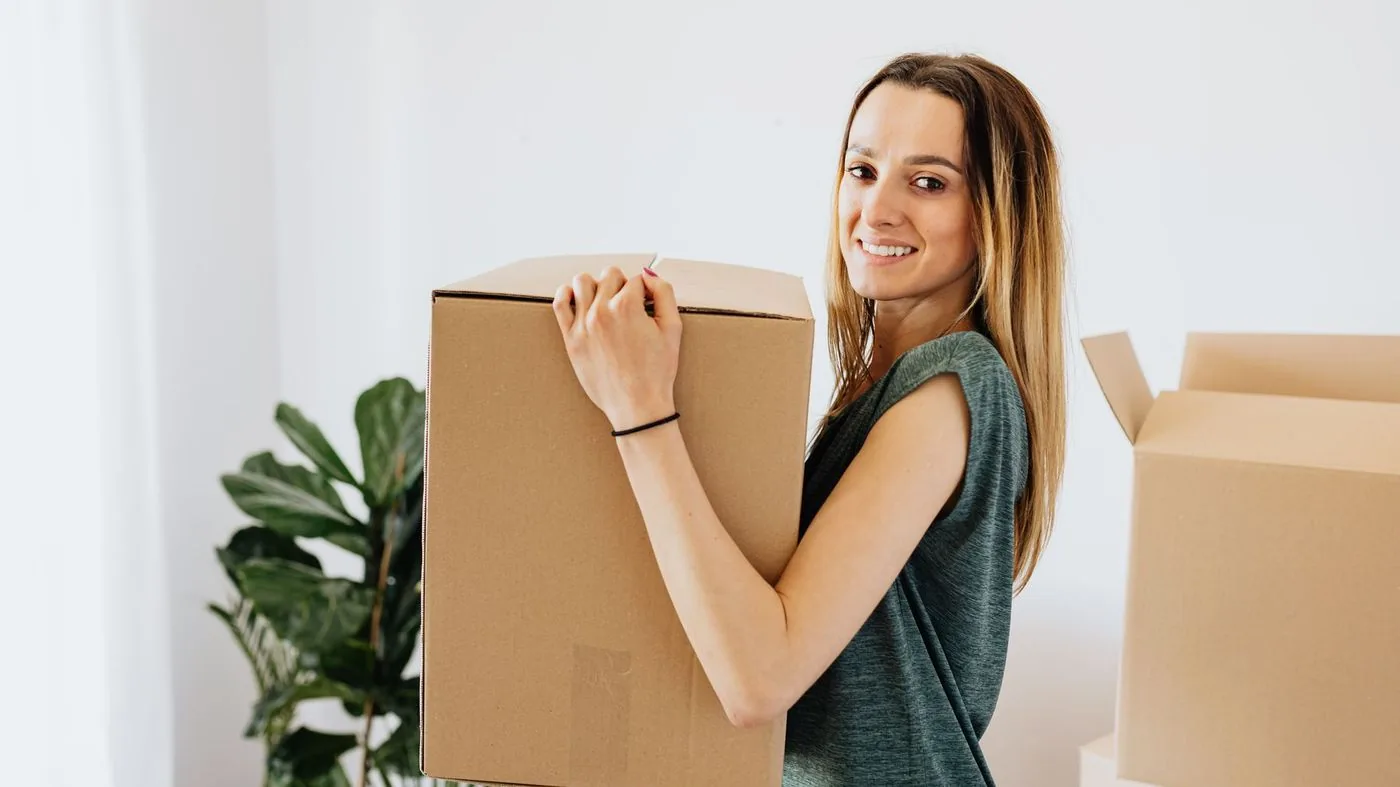 Moving boxes stacked in an empty new apartment