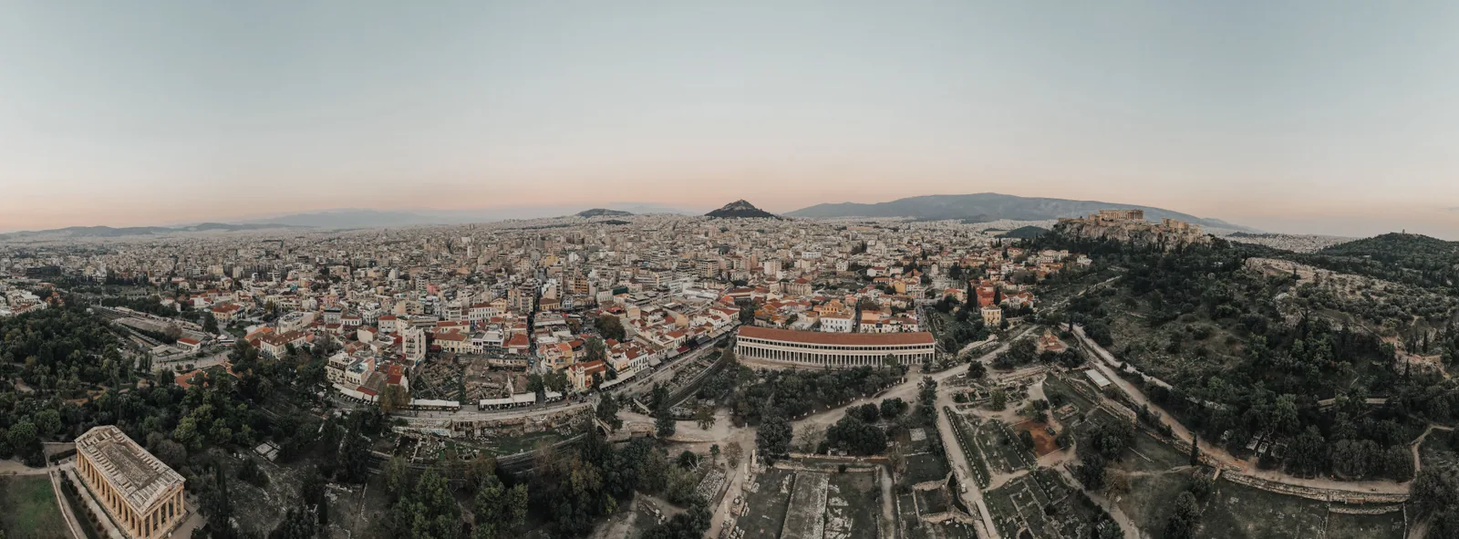 Athens from above, the Acropolis on the right and the city reaching to the mountains